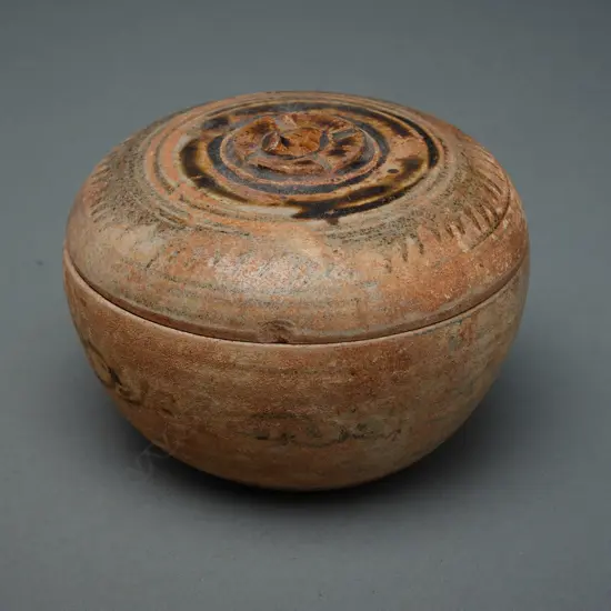 Sawankhalok stoneware covered box, 13th-16thC, greyish buff clay, 83 x 112mm (deterioration to glaze)